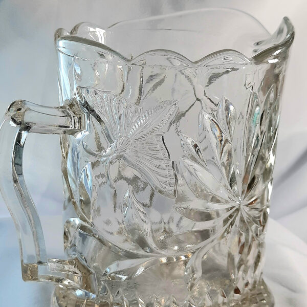 butterfly moth glass jug