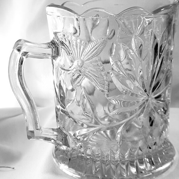 butterfly moth glass jug