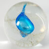 teal and pale gold paperweight