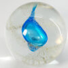 teal and pale gold paperweight