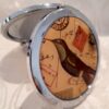 hummingbird ladies mirror compact