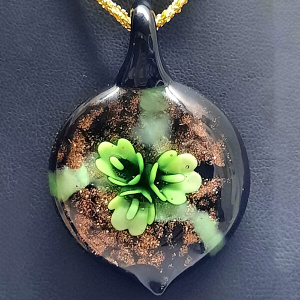 murano style glass pendant with green foliage