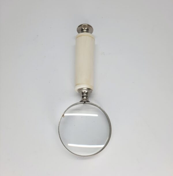 vintage magnifying glass and letter opener