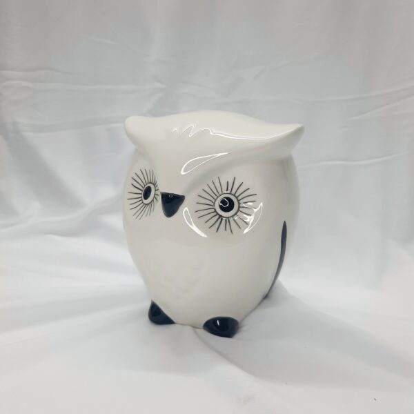 pair of white decor owls ornaments