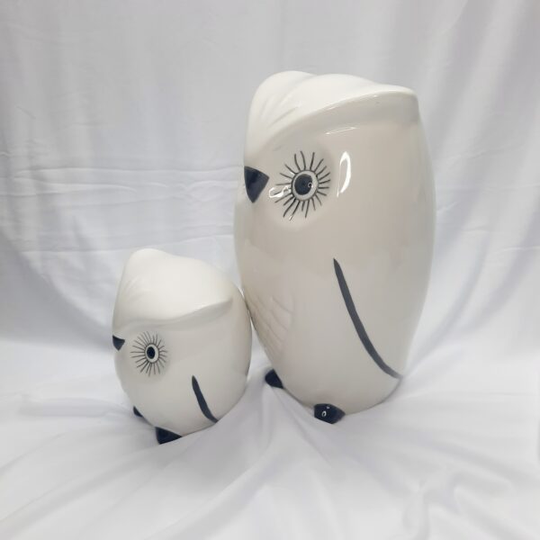 pair of white decor owls ornaments