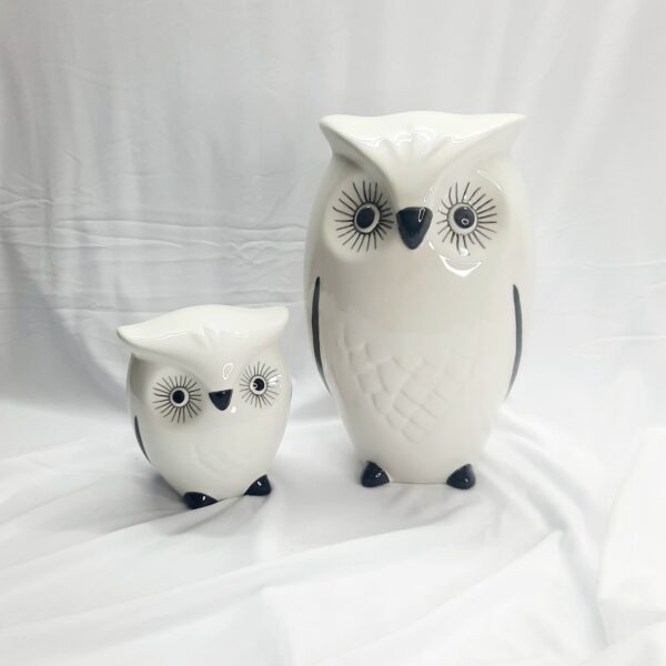 pair of white decor owls ornaments