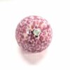 pink and white glass oil burner
