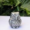 silver metal owl figurine