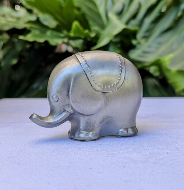 silver metal elephant statue