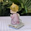 vintage praying children figurine